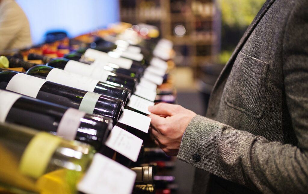 Young man in a wine shop